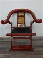Red lacquered Asian horseshoe back & leather