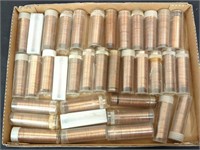 Box of 36 rolls of antique Mexican coins. In case