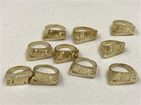 Lot of brass Nike rings