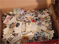 Shoebox full of Assorted Used Stamps from Various