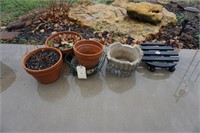 Assorted pots and rolling pot stand