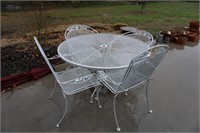White patio table with 4 chairs