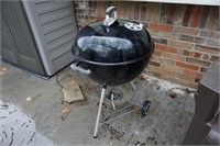 Weber Grill with utensils