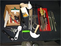 Assortment of kitchen knives and tools