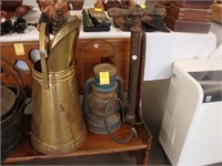 Brass coal hod, lantern, and an air pump.