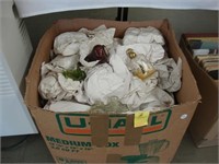 Large box of Avon collectibles.