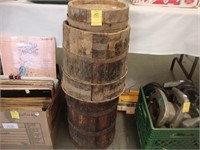 Three old wooden barrels.