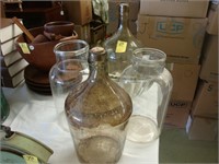 Two old kitchen jars, two wine jugs and a large