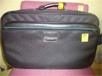 Black Samsonite soft side piece of luggage.
