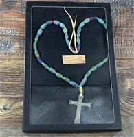 Jesuit cross strung on leather with blue white hea