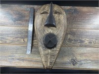 Hand carved wood African wall hanger, 18" long