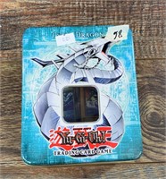Tin with Yu-gi-oh trading cards