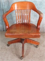 ANTIQUE WOOD DESK CHAIR ON CASTERS