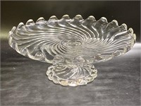 Glass cake stand measuring 11 inches in diameter