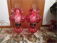 Two hurricane lamps