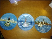 Three light house decorative plates