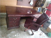Desk and chair. Desk is 30 in tall, 66in wide and