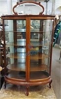 Beautiful unique oval Oak china cabinet