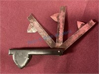 Antique folding bloodletting tool