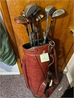 Assorted golf clubs