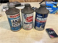 3 old automotive cans, one is empty