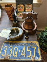 Metal whiskey coasters, shool bell, licence plate