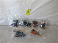 6 mini figures still in packages
