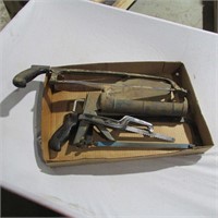 assorted saws, caulk gun