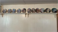 11 collector's plates with wall shelves