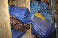 COLLECTION OF USED TARPS LARGE AND SMALL