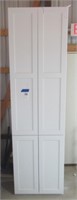 White (4) door base cabinet. Measures 97 1/2" H x