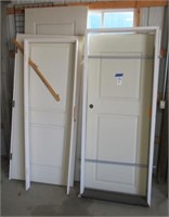 Group of (8) doors and jambs. Largest door