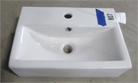 Porcelain bathroom sink. Measures 18" W x 12" D.