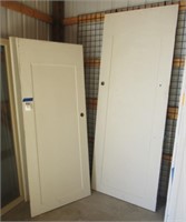 (2) Single panel wood interior doors. Largest