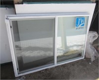 JELD-WEN horizontal sliding window. Measures 70