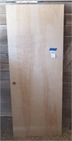 Wood solid core door. Measures 31 3/4" W X 80" H.
