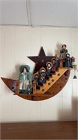 Wooden stairs with amish figurine collection