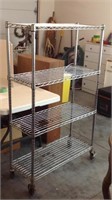 Metal shelf on rollers 35x14x59
