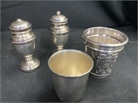 Two Sterling Shakers with Measuring Cups