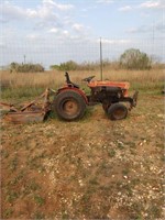 Tractor and bush hog cutter