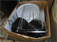 Box of plastic plates and fried food baskets