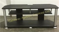 Black Television stand . 43 inches long, 16
