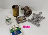 Antique iron holder, pencil sharpener, soap tin