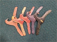 Carved bird clothes hangers