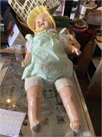 Antique doll shows signs of wear
