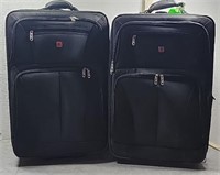 A8- (2) LARGE SUITCASES IN GOOD CONDITION