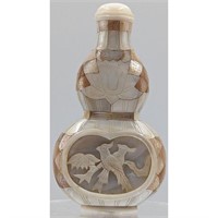A Finely Carved Mother Of Pearl Snuff Bottle