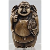 A Finely Carved Resin Japanese Figure