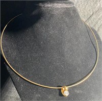 Gold tone necklace