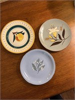 Strangl Pottery plates. Three pieces each year